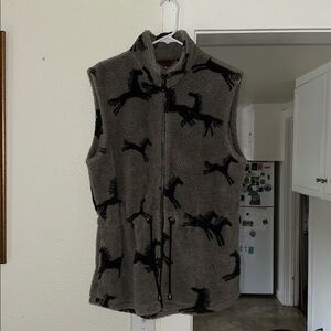 Vintage Tsunami sweater vest size Medium. Excellent condition.